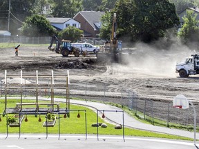 Construction of a new turf field continues behind the school yard at Academie Sainte-Anne Academy in Dorval on Monday August 29, 2016. The installation of the field is a joint project between the private school and the City of Dorval. (John Mahoney / MONTREAL GAZETTE)