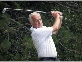 Elm Ridge Country Club golf pro Andrew Phillips hits balls at the club in Île-Bizard on August 8, 2016. Phillips will be heading to the Olympics in Rio this week to coach Israeli golfer Laetitia Beck and will be her caddy. (John Mahoney} / MONTREAL GAZETTE)