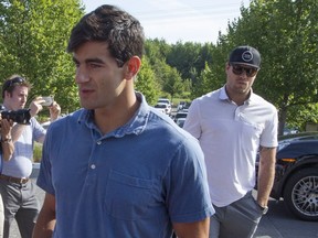 Canadiens captain Max Pacioretty, left, arrives with new teammate Shea Weber at Le Mirage Golf Club in Terrebonne, north of Montreal, Tuesday August 9, 2016, for the Michel Therrien Golf Invitational.  Weber was making his first public appearance since being traded from the Nashville Predators for P.K. Subban.