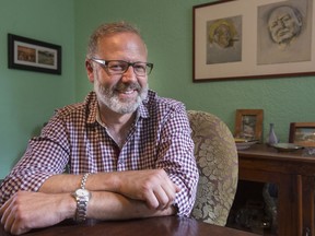 Kent Hovey-Smith in his dining room where a couple of prints of Winston Churchill  hang. (Peter McCabe / MONTREAL GAZETTE)