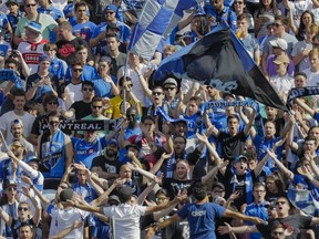 Montreal Impact fans cheer during the first half of the MLS soccer match between the Montreal Impact and the New York City FC at Saputo Stadium in Montreal on Sunday, July 17, 2016.