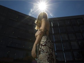 A woman who said she was sexually assaulted on John Abbott College campus while taking a summer class in June. She his pictured in front of the school's science building.