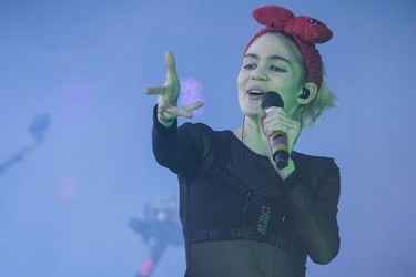 Canadian musician Grimes (Claire Elise Boucher) performs on day three of the Osheaga Music Festival at Jean-Drapeau Park in Montreal on Sunday, July 31, 2016.