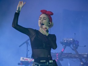 Grimes (pictured at the Osheaga festival in July) will take part in the Global Citizen concert at Montreal’s Bell Centre on Sept. 17.