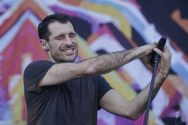 Felix Riebl of the Australian band The Cat Empire performs on day three of the Osheaga Music Festival at Jean-Drapeau Park in Montreal on Sunday, July 31, 2016.