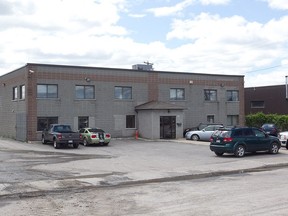 Both these buildings, located 25 metres apart at 9850 (left) and 9800 la Martinière St. in Rivière-des-Prairies, have been home to more than one construction firm.