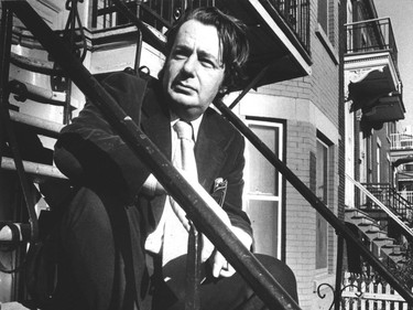 Novelist Mordecai Richler in 1979, sitting on the steps of 5257 St-Urbain St., where he once lived.