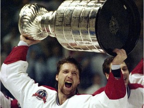 Patrick Roy holds the Stanley Cup aloft after the Canadiens won the Stanley Cup in 1993.  GOALTENDER PATRICK ROY HOISTS STANLEY CUP IN 1993, THE LAST TIME THE STORIED MONTREAL FRANCHISE WON THE CHAMPIPONSHIPS. The Canadiens won an unprecedented 10 consecutive overtime games en route to their improbable Stanley Cup win in 1993. A Canadian team hasn't hoisted the Stanley Cup since Patrick Roy and the Canadiens did it in 1993.  Patrick Roy hoists Stanley Cup after Canadiens' victory in 1993.  (THE GAZETTE/ JOHN MAHONEY)