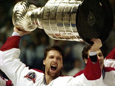 June 9, 1993: Patrick Roy holds the Stanley Cup aloft after the Montreal Canadiens beat Wayne Gretzky and the Los Angeles Kings in five games. No Canadian team has hoisted the Stanley Cup since then.
