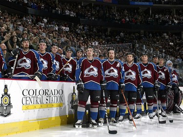 Oct. 28, 2003: The Colorado Avalanche watch as goalie Patrick Roy helps retire his number 33 before a game against the Calgary Flames at the Pepsi Center in Denver, Colorado. Roy retired after the previous season.