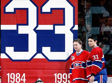 Nov. 22, 2008: Former Montreal Canadiens goalie Patrick Roy and current goalie Carey Price stand next to the #33 banner during Roy's retirement ceremony before a game against the Boston Bruins at the Bell Centre.