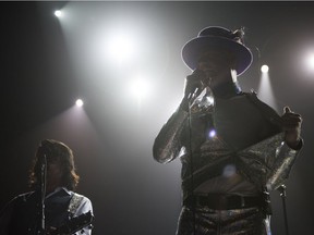 Paul Langlois, left, and Gord Downie of The Tragically Hip perform last week in Toronto.