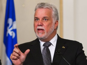 Quebec Premier Philippe Couillard shuffled his cabinet on Aug. 20, the third since the beginning of the year. Despite the troubles dogging his Liberal government, the party leads in public opinion polls.