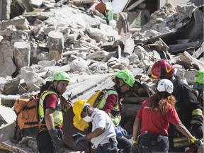 Rescuers clear debris while searching for victims in damaged buildings in Arquata del Tronto, Italy. Central Italy was struck by a powerful, 6.2 magnitude earthquake in the early hours of Wednesday (24Aug16), killing at least 38 people and devastating dozens of mountain villages. Numerous buildings have collapsed in communities close to the quake's epicentre, located near the town of Norcia in the region of Umbria. Witnesses have told Italian media, with an increase in the death toll highly likely.