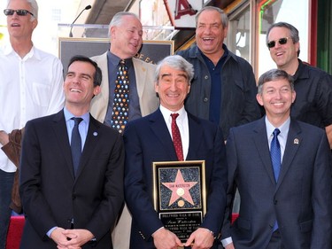 Concordia grad and Law & Order producer René Balcer (top right), with actor Ted Danson, Los Angeles city council president Eric Garcetti, councilman Tom LaBonge, actor Sam Waterston, producer Dick Wolf, and Hollywood Chamber of Commerce president Leron Gubler, attend The Hollywood Walk of Fame Star ceremony honouring actor Sam Waterston in 2010, in Hollywood, Calif.