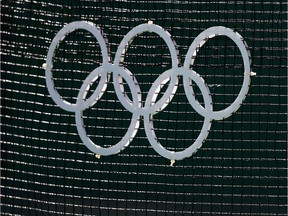 RIO DE JANEIRO, BRAZIL - AUGUST 13:  A detailed view of the rings on the net as Andy Murray of Great Britain plays against Kei Nishikori of Japan during the Men's Singles Semifinal Match on Day 8 of the Rio 2016 Olympic Games at the Olympic Tennis Centre on August 13, 2016 in Rio de Janeiro, Brazil.