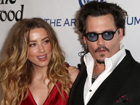 Amber Heard has accepted $7 million U.S. from Johnny Depp. In return, she drops her claims of domestic abuse, calling their relationship "volatile."