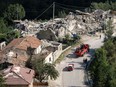 In Amatrice, Italy, parts of streets were devastated by an earthquake.