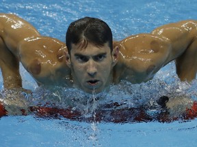 United States' Michael Phelps leaves the pool after winning a heat of the men's 200-meter individual medley during the swimming competitions at the 2016 Summer Olympics, Wednesday, Aug. 10, 2016, in Rio de Janeiro, Brazil.