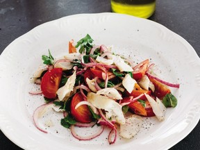 Wedges of freshly cut tomatoes are combined with halibut in this salad from Barton Seaver.