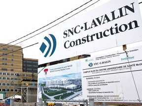MONTREAL, QUE.: FEBRUARY 27, 2013--An SNC Lavalin sign displays the company's involvement in the MUHC Glen yard construction project, in Montreal on Wednesday, February 27, 2013. (Allen McInnis/THE GAZETTE) ORG XMIT: 46058