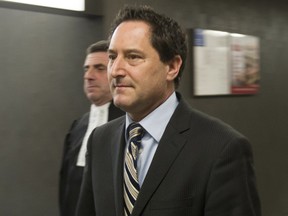 Former Montreal mayor Michael Applebaum, right, arrives at the Montreal courthouse with his lawyer, Pierre Teasdale, June 28, 2016.