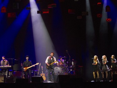 Don Henley (just left of centre under spotlight) in performance with his band at the Bell Centre in Montreal on Wednesday, Sept. 14, 2016.