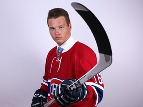 Defenceman Mikhail Sergachev poses for a portrait after being selected ninth overall by the Canadiens at the NHL Draft on June 24, 2016 in Buffalo.
