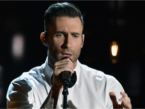 Singer Adam Levine of Maroon 5 performing at the 87th Annual Academy Awards at Dolby Theatre on February 22, 2015 in Hollywood, California.