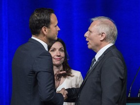 PQ leadership candidates Alexandre Cloutier, left, Jean-François Lisée and Martine Ouellet following a debate in Montreal on Sept. 25.