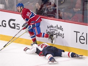 Montreal Canadiens' Andrew Shaw skates away after checking Washington Capitals' Connor Hobbs into the boards during second period NHL pre-season hockey action Tuesday, September 27, 2016 in Montreal. Shaw will have a hearing with the NHL to determine if a fine or suspension is warranted after boarding a Washington Capitals player during a pre-season game, the league's department of player safety announced Wednesday.