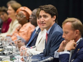 Canadian Prime Minister Justin Trudeau speaks Friday at a luncheon during the Fifth Replenishment Conference of the Global Fund to Fight AIDS, Tuberculosis and Malaria, in Montreal.