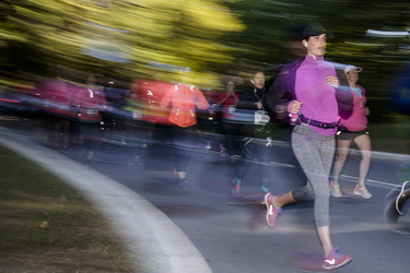 Participants run through Jean-Drapeau park as they take part in the Rock 'N' Roll Montreal Marathon on Sunday, September 25, 2016.