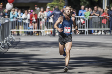 Kari Steinn Karlsson of Iceland arrives at the finish line at Lafontaine Park to win the Rock 'N' Roll Marathon with a time of 2:24:18.6 in Montreal on Sunday, September 25, 2016.