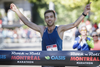 Kari Steinn Karlsson of Iceland arrives at the finish line at Lafontaine Park to win the Rock 'N' Roll Marathon with a time of 2:24:18.6 in Montreal on Sunday, September 25, 2016.
