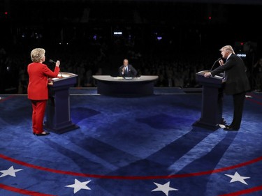 Democratic presidential nominee Hillary Clinton and Republican presidential nominee Donald Trump spar during the presidential debate at Hofstra University in Hempstead, N.Y., Monday, Sept. 26, 2016.
