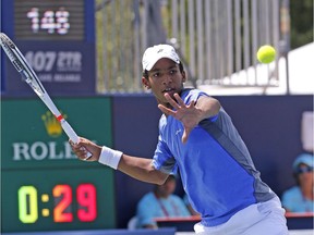 Montreal's Félix Auger Aliassime hits shot during qualifying match at the Rogers Cup in Toronto on July 23, 2016.
