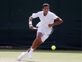 Canadian teenager Félix Auger-Aliassime will play for a boys' singles Grand Slam title for the second time this season. Auger-Aliassime returns to Alex De Minaur of Australia during their boy's singles match of the Wimbledon Tennis Championships in London, in a July 7, 2016, file photo.