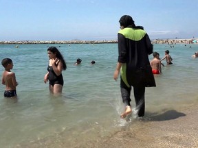 A burkini-clad woman in France walks into the sea: This summer’s Parti Québécois leadership race and Coalition Avenir Québec’s crusade against the burkini have generated enough identity rhetoric to lower the debate to levels not seen since 2013’s failed Charter of Values, Dan Delmar writes.