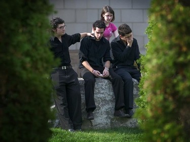 Friends and students of Anastasia De Sousa gather outside a mausoleum in Laval, Sept. 18, 2006, after visiting the victim of the Dawson College tragedy. The STM made available 20 buses to transport students from the College.
