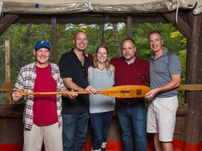 From left: Andrew Caddell, Travis Skinner, Carol Skinner, former YMCA Camp Kanawana directors Sean Day and Bruce Netherwood, at Kanawana's Family, Alumni and Friends Weekend Sept. 10-11. Carol Skinner received the Pip Award, which recognizes the contributions of alumni who best exemplify the camp’s spirit.