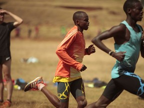 A scene from the documentary: Julius Arile, centre, runs in Kamariny Stadium in Iten, Kenya's town of champion marathon runners.