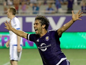 Orlando City's Kaka celebrates after teammate Cyle Larin scored against the Montreal Impact during the second half of an MLS soccer game, Saturday, May 21, 2016, in Orlando, Fla. Orlando won 2-1.