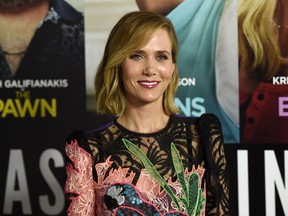 Kristen Wiig, a cast member in "Masterminds," poses at the premiere of the film at the TCL Chinese Theatre on Monday, Sept. 26, 2016, in Los Angeles.