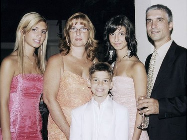 Eighteen-year-old Dawson College student, Anastasia De Sousa (left), was shot and killed during the shooting rampage and 19 people were injured. De Sousa is seen here with her mother Louise, brother Nick, sister Sarah and father Nelson.