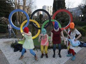 Members of Pussy Riot stage a guerrilla performance at the Sochi Olympics in 2014.