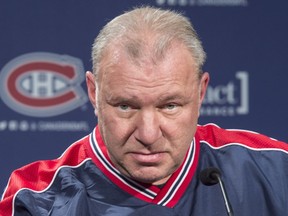 Canadiens head coach Michel Therrien listens to a question during a news conference following practice on Jan. 13, 2016 in Brossard.