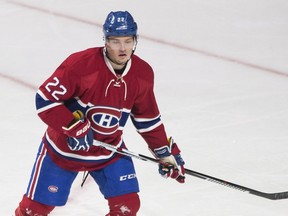 Montreal Canadiens' Mikhail Sergachev looks for a pass during first period NHL pre-season hockey action against the Ottawa Senators in Montreal, Thursday, September 29, 2016.