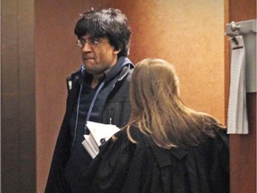 Activist Jaggi Singh, seen here in April 2016 at the Montreal courthouse to lend support in another case, plans to present a motion in municipal court on Friday arguing that the recording of fingerprints and mug shots after people are arrested for summary offences is illegal.