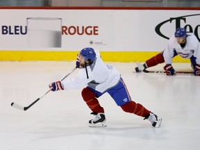 Canadiens centre David Desharnais and Torrey Mitchell, right, get in some extra ice time in Montreal on Wednesday August 17, 2016. Players rented the Canadiens training facility in Brossard to get ready for training camp.